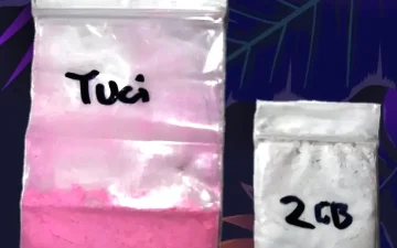Bags of pink tusi powder and white 2C-B powder